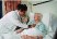 Library image of elderly lady in hospital bed